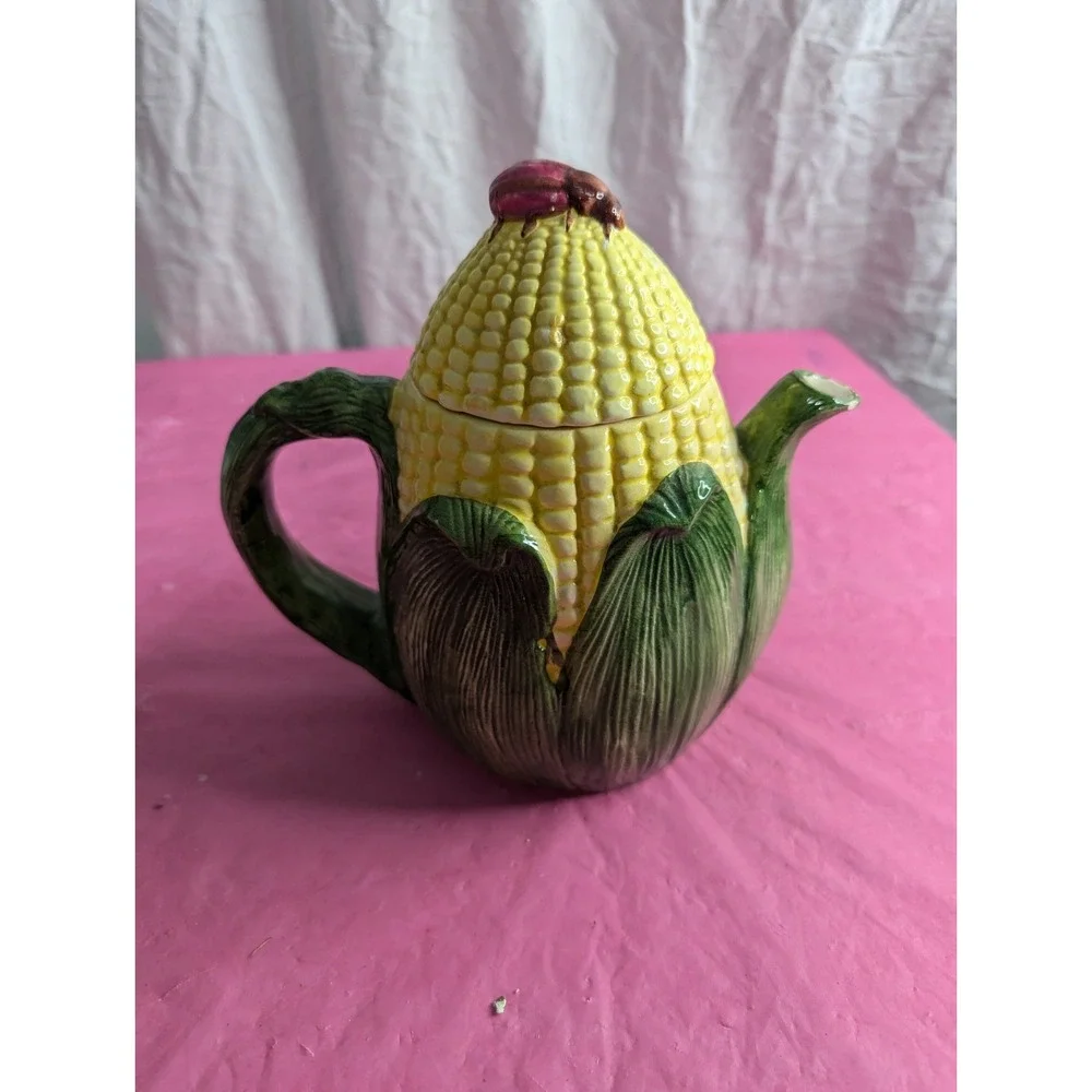 Corn husk teapot with lady bug beetle‎ ? at top  7.5